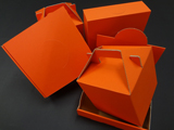 オレンジ色の梱包兼陳列とギフト箱